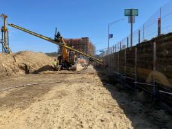 Drill Tech drilling tiebacks in shoring wall