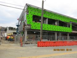 Installing Exterior Drywall at Building Exterior