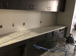 Install countertop in Room 2303